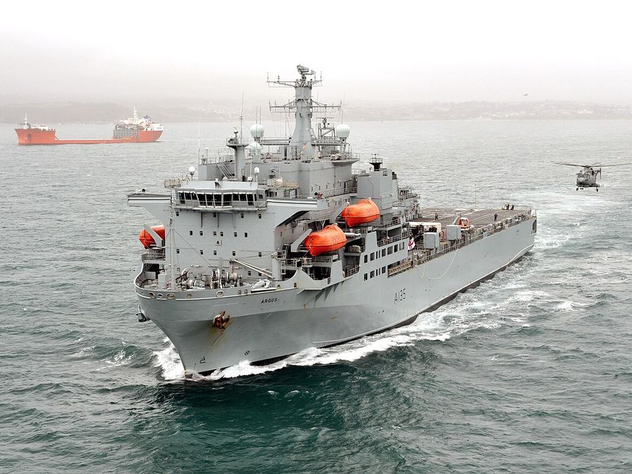 RFA Argus, the UK's primary casualty receiving ship, under way with a helicopter alongside